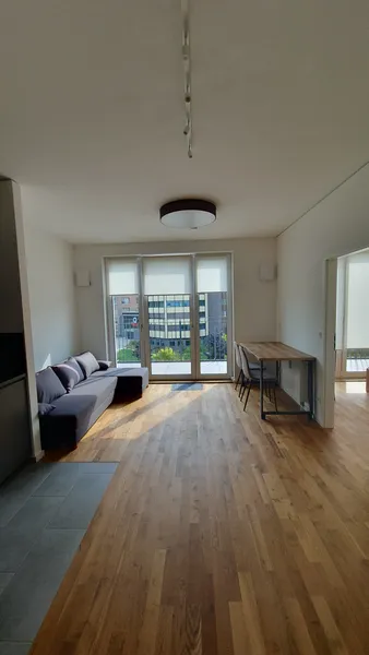 Moderne, voll möblierte 2-Zimmer-Neubauwohnung im obersten Geschoss mit großem Südwestbalkon — photo 1